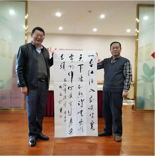 西部蘭亭詩書畫院首屆會員潑墨迎新年會 翰墨飄香迎新春，文化交流暖意濃